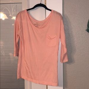 Three quarter length T-shirt.